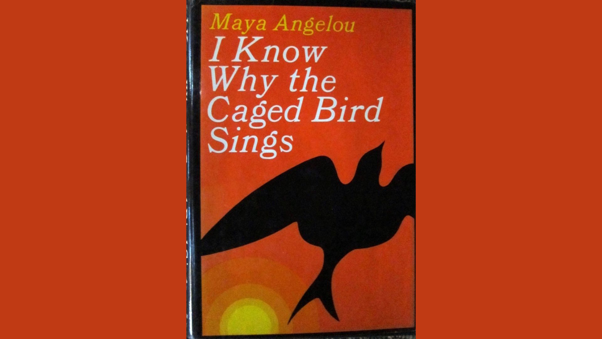 A book cover featuring a caged bird, symbolizing themes of freedom and resilience in Maya Angelou's autobiography.