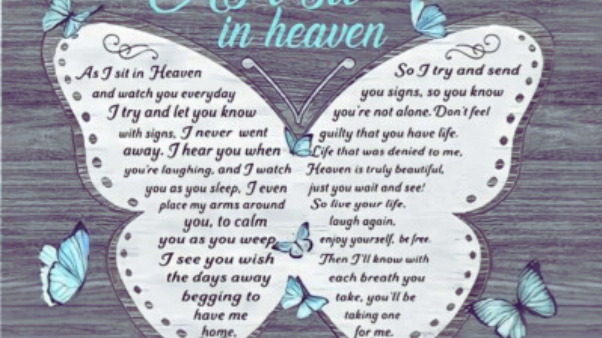 Butterfly memorial plaque featuring an engraved tribute to a loved one, surrounded by floral designs.