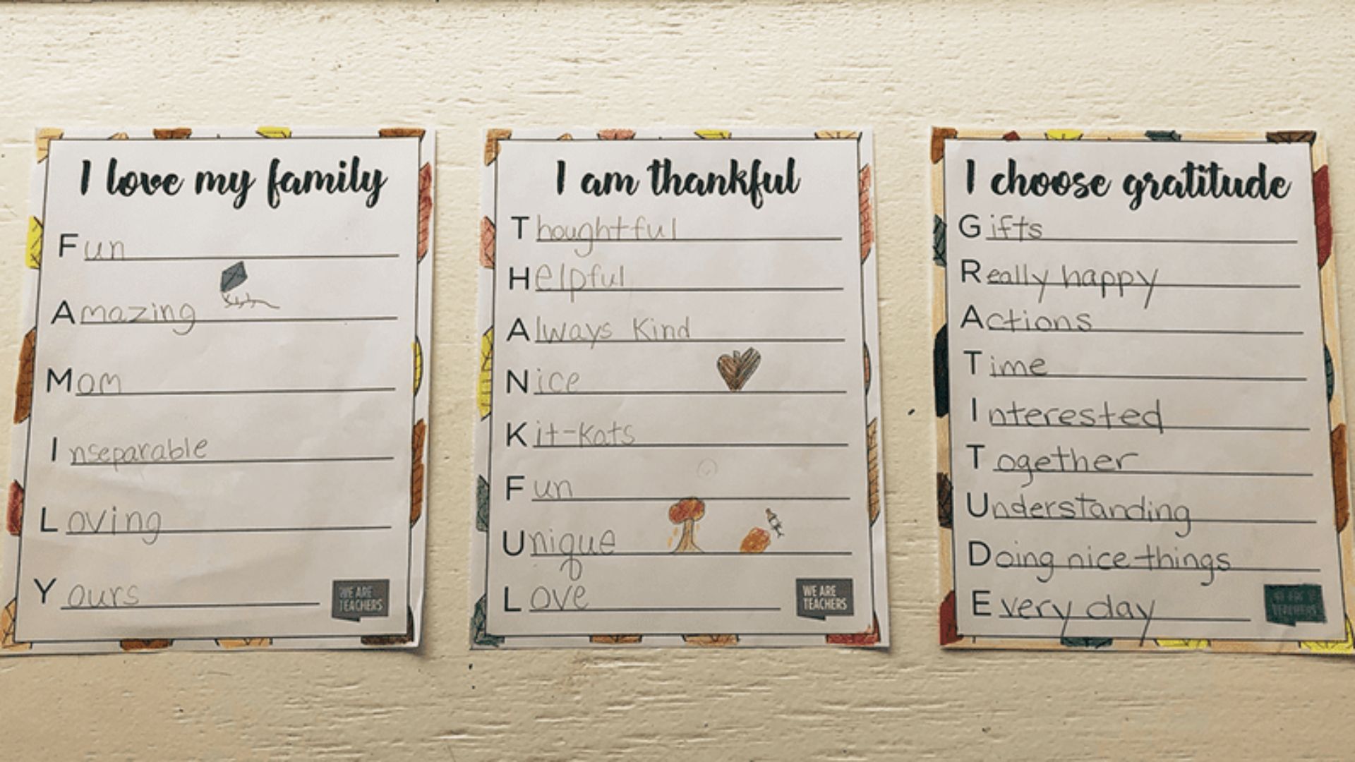 Three handwritten student acrostic poems for FAMILY, THANKFUL, and GRATITUDE displayed on classroom posters with fall borders.