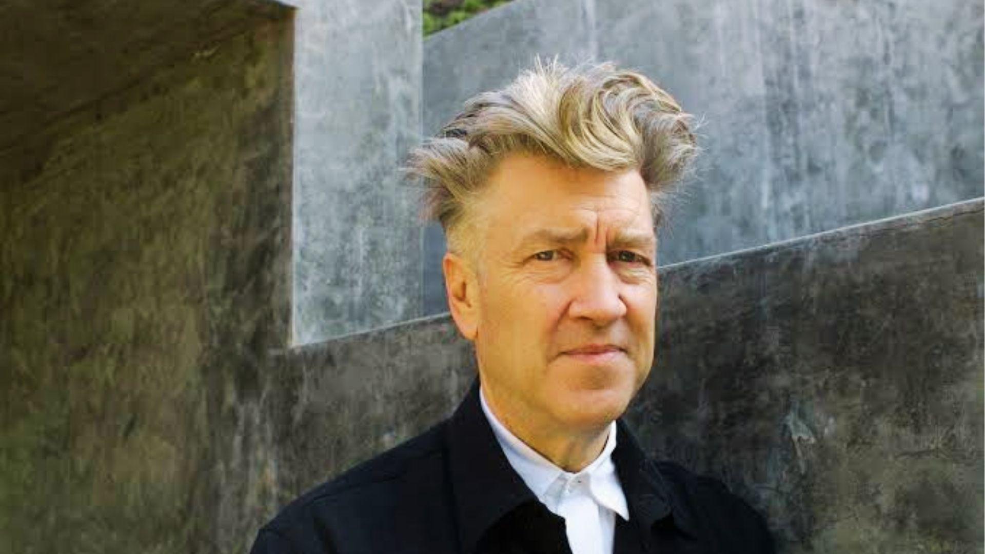 David Lynch with his signature swept-back gray hairstyle