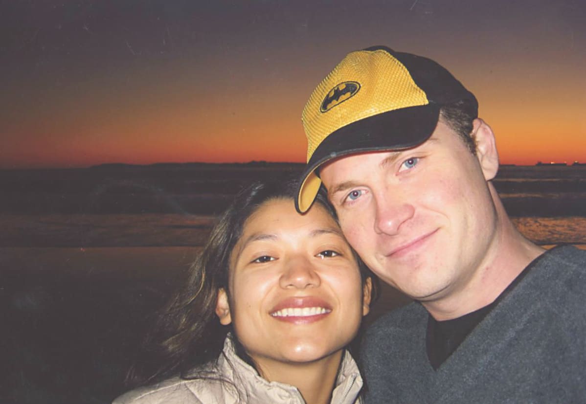 Reyna Grande with her husband Cory, at beach, sunset setting in the background