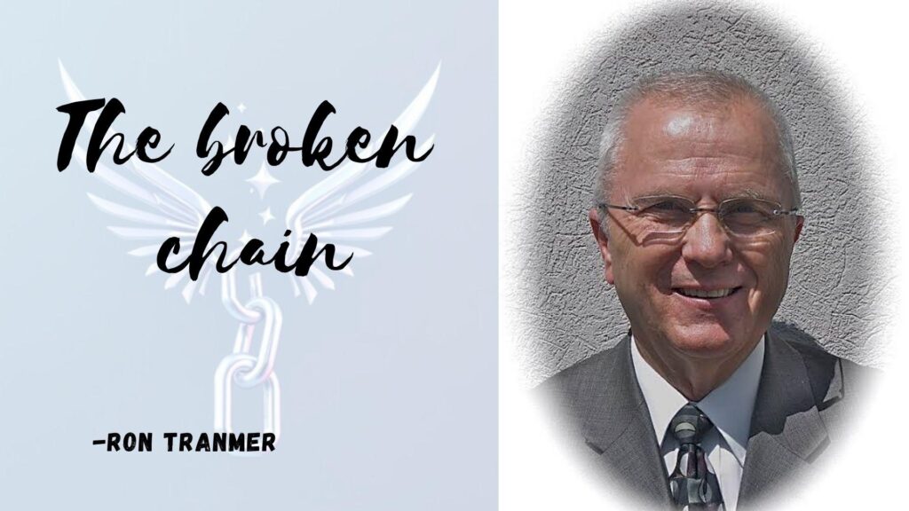 Book cover graphic with text "The broken chain - Ron Tranmer", winged broken chain icon, and portrait of smiling man in suit