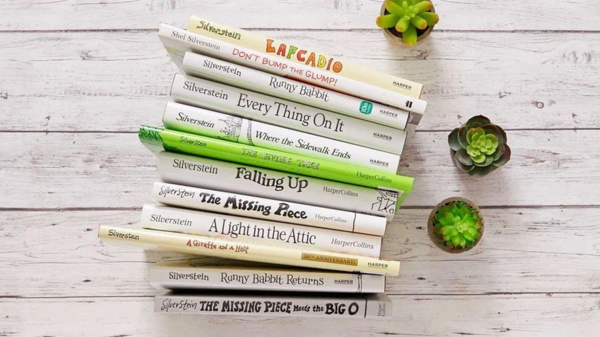 A stack of Shel Silverstein poetry collections on a wooden table